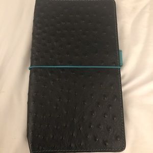 Van Dek Spek Complete Nomad in black ostrich.